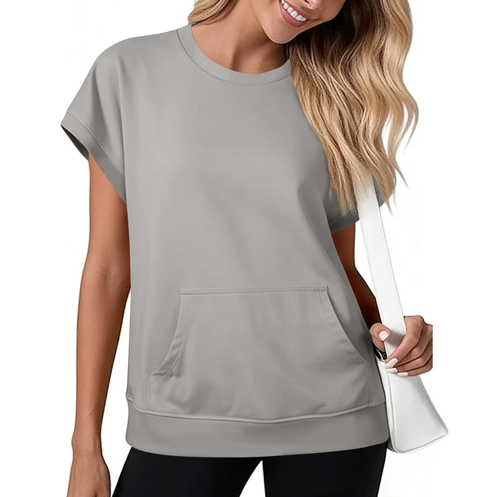 Loose-fitting solid color short-sleeved top with pockets